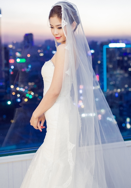 Á hậu Diễm Trang diện váy cưới 70 triệu đồng trắng tinh khôi.